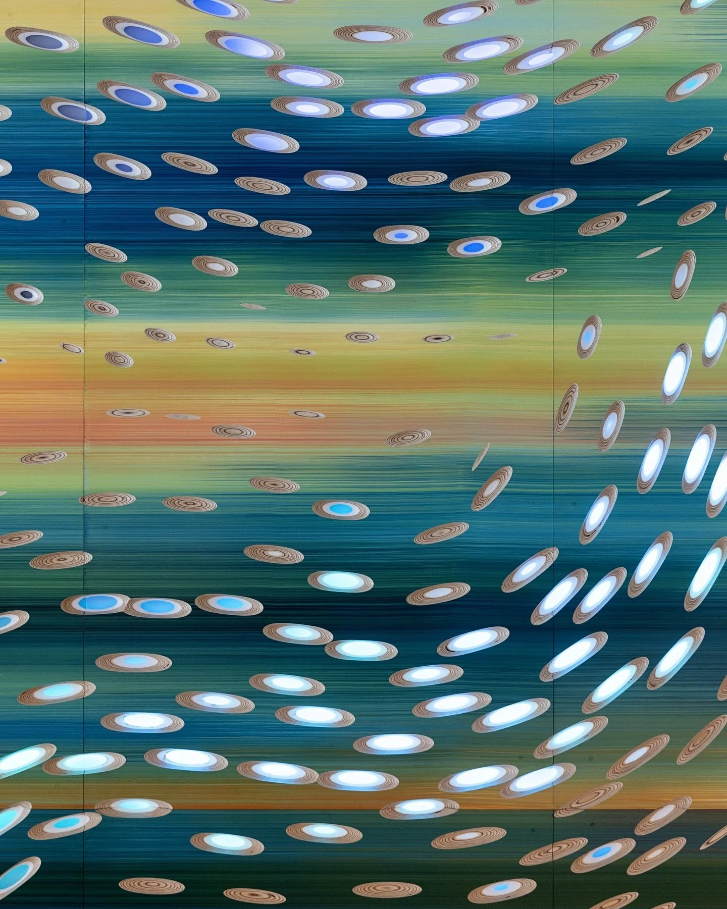 Swipe left for the transformation.

Before &amp; after of this staircase-pre-color wall.

A vibrant fusion of color and craft: intentional hues, CNC-carved patterns, and a process we loved watching unfold.

Thanks to @trammellcrowcenter for the oppor