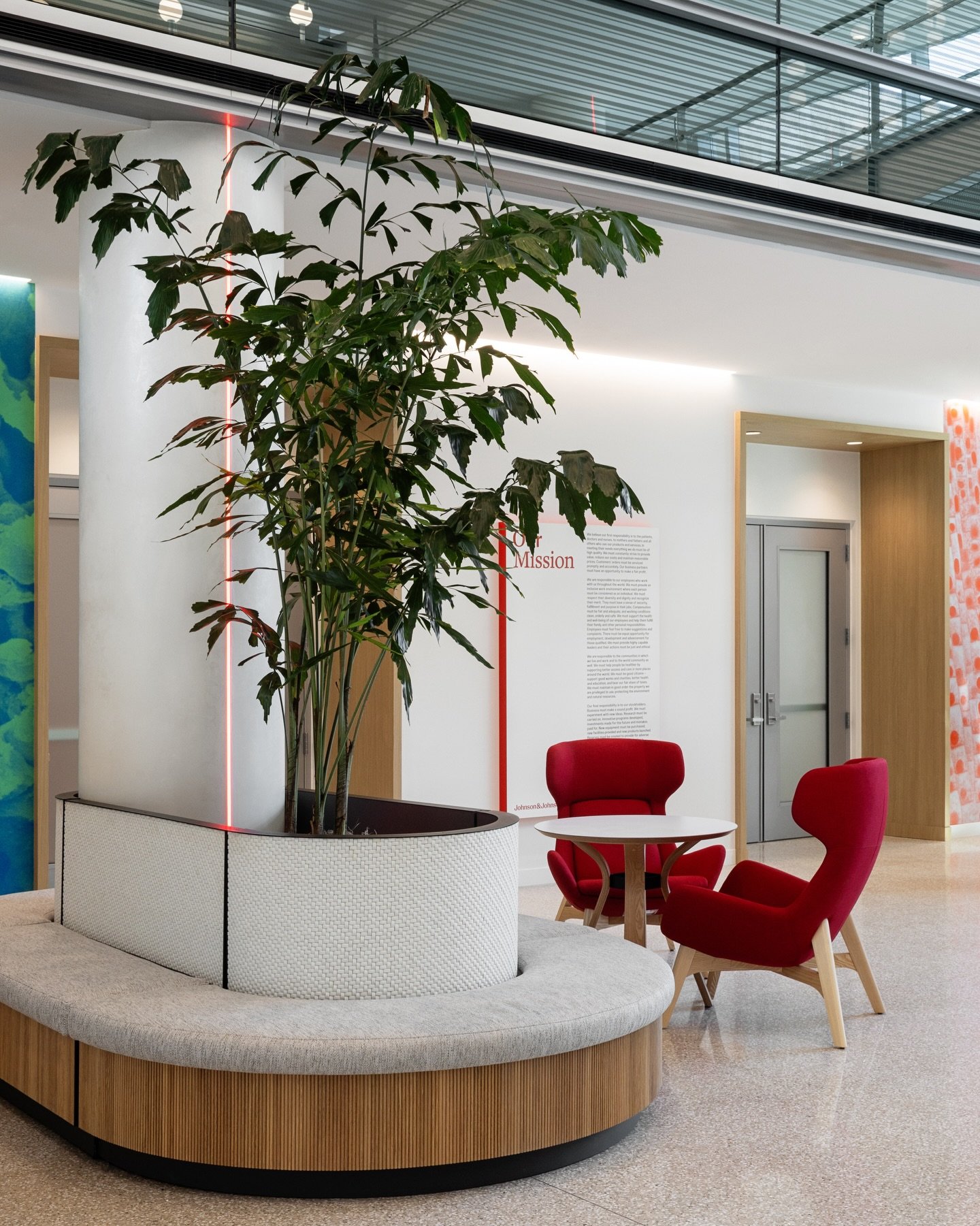A clean, welcoming lobby designed to set the tone from the moment you arrive.

This project brought together custom millwork elements-including a statement lobby wall, reception desk, and a sculptural pill-shaped banquette
&mdash; in a refined palett