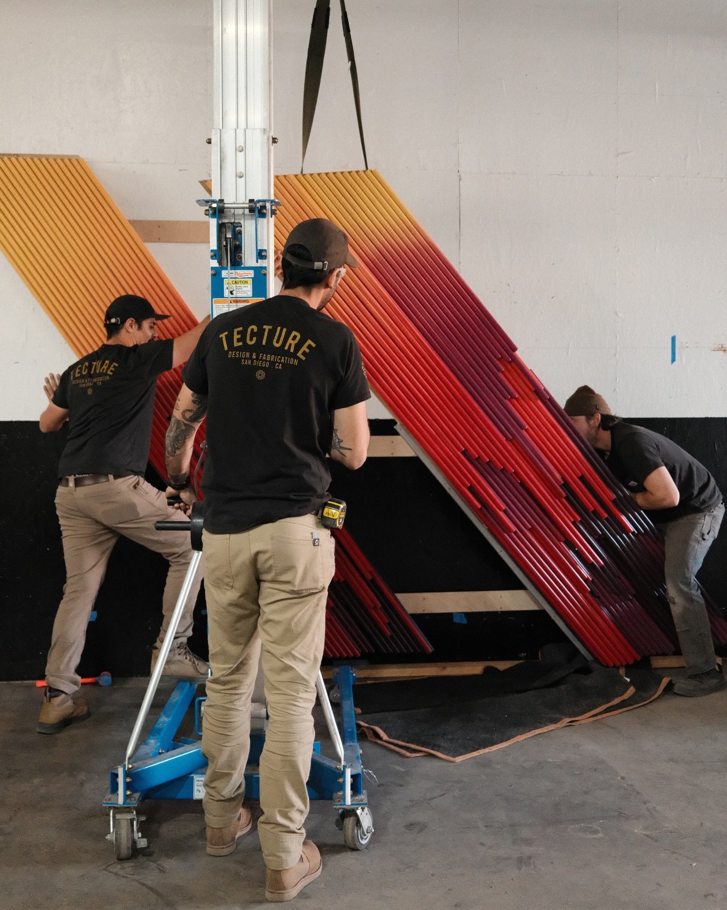 We&rsquo;re in full color mode with a large-scale installation coming together in-house with lots of
PVC tubes, bent, layered, and turning onto the ceiling.

The wall installation is finished in a custom gradient, with LEDs and diffusers integrated t