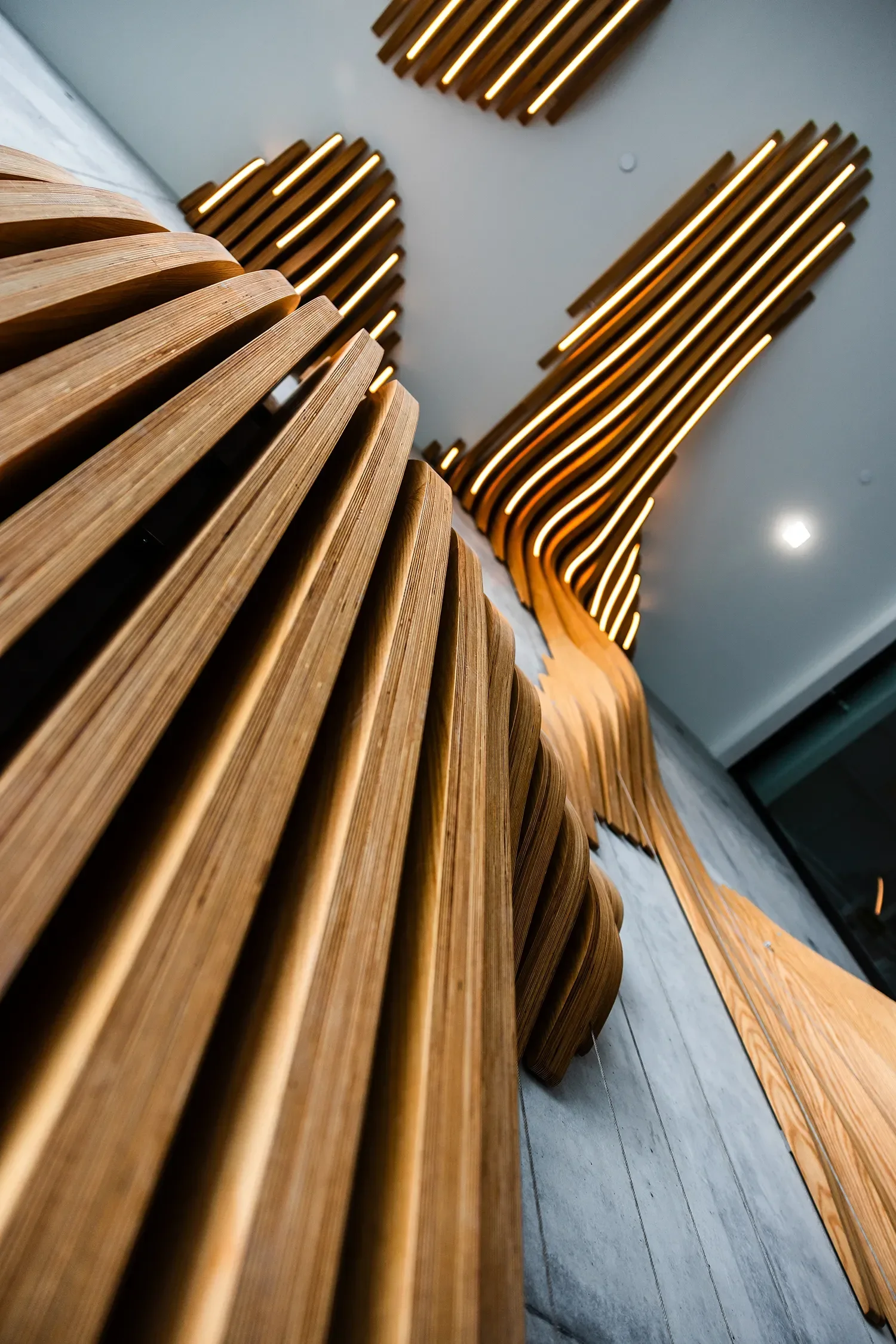 Detail of the Parametric Wall wood slat fins forming a sculptural feature wall