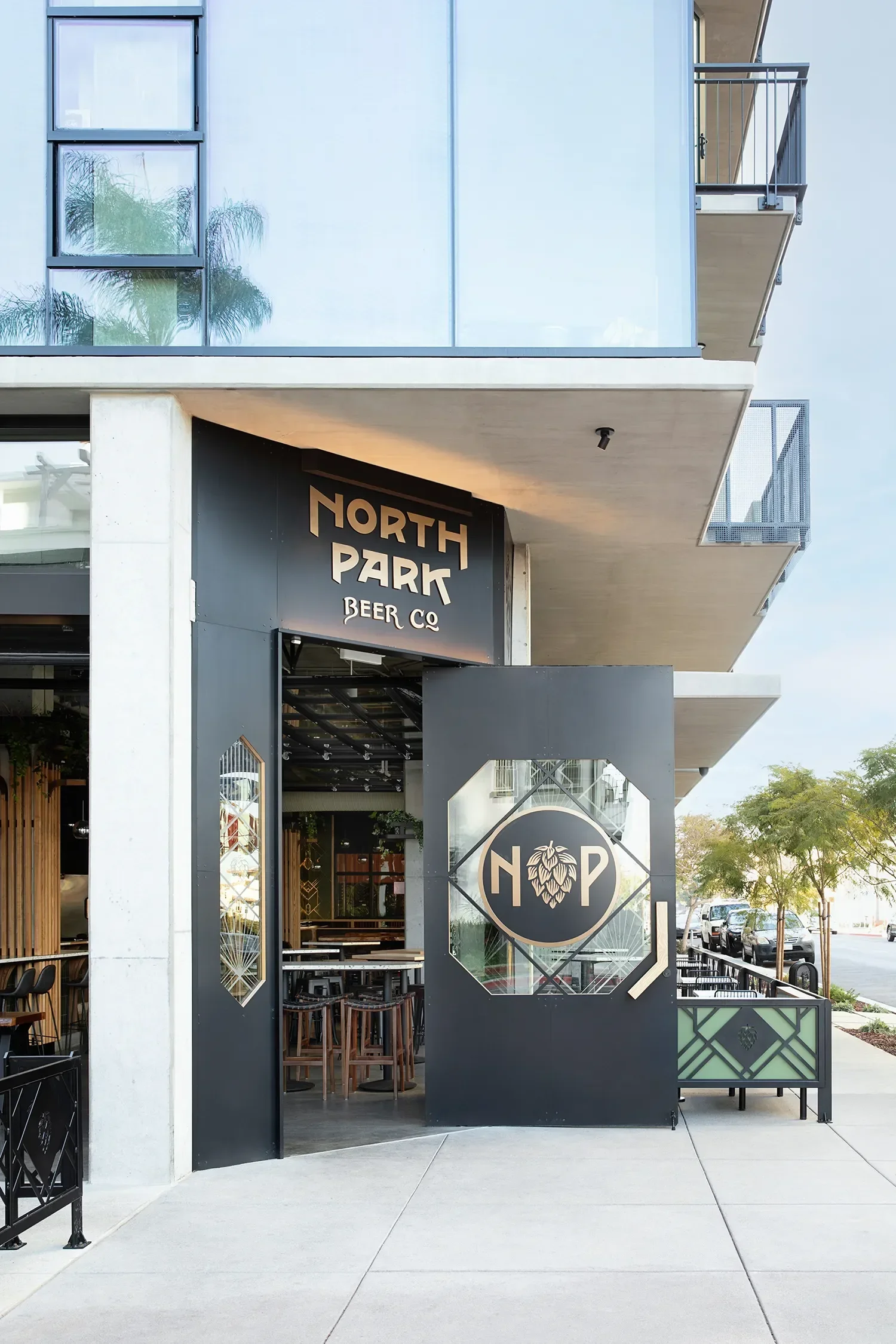 North Park Beer Co in Bankers Hill custom fabricated black metal door and brass signage