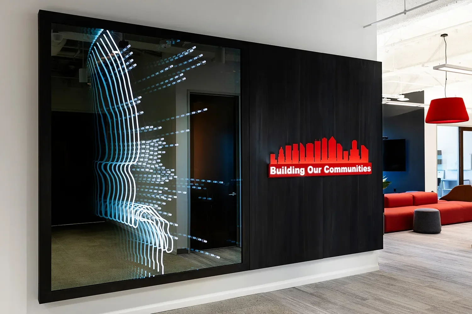 Infinity Mirror art installation feature with LED lighting mapping the companies growth over time at McCarthy San Diego office