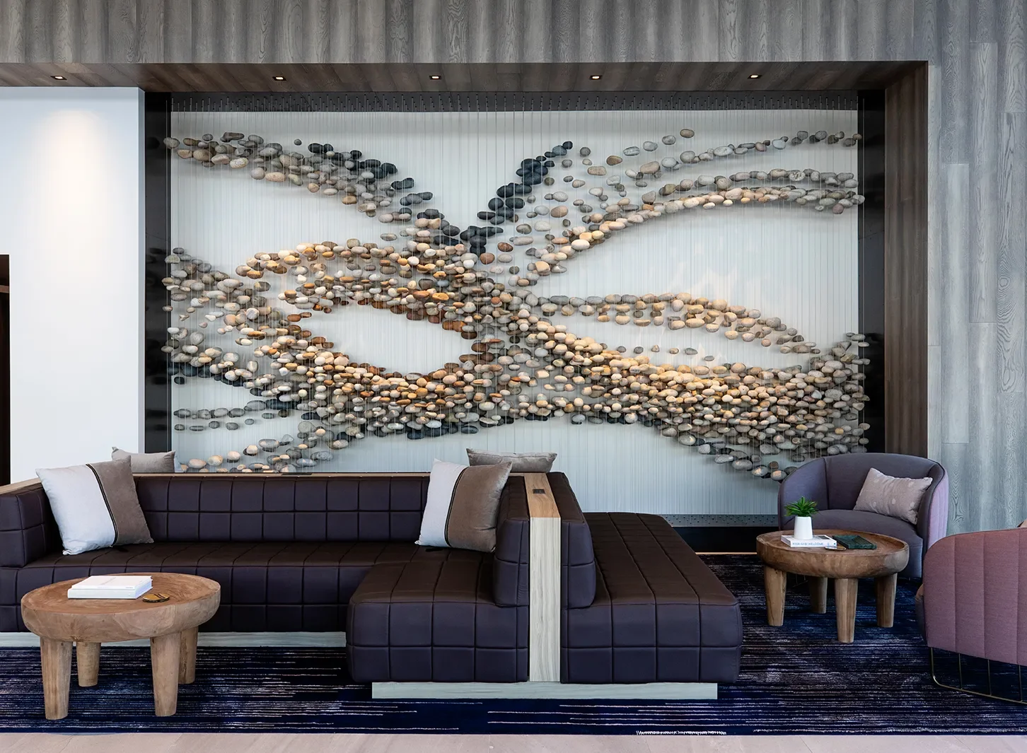 Stone Flock, ten thousand pounds of beach stone suspended in a San Diego lobby