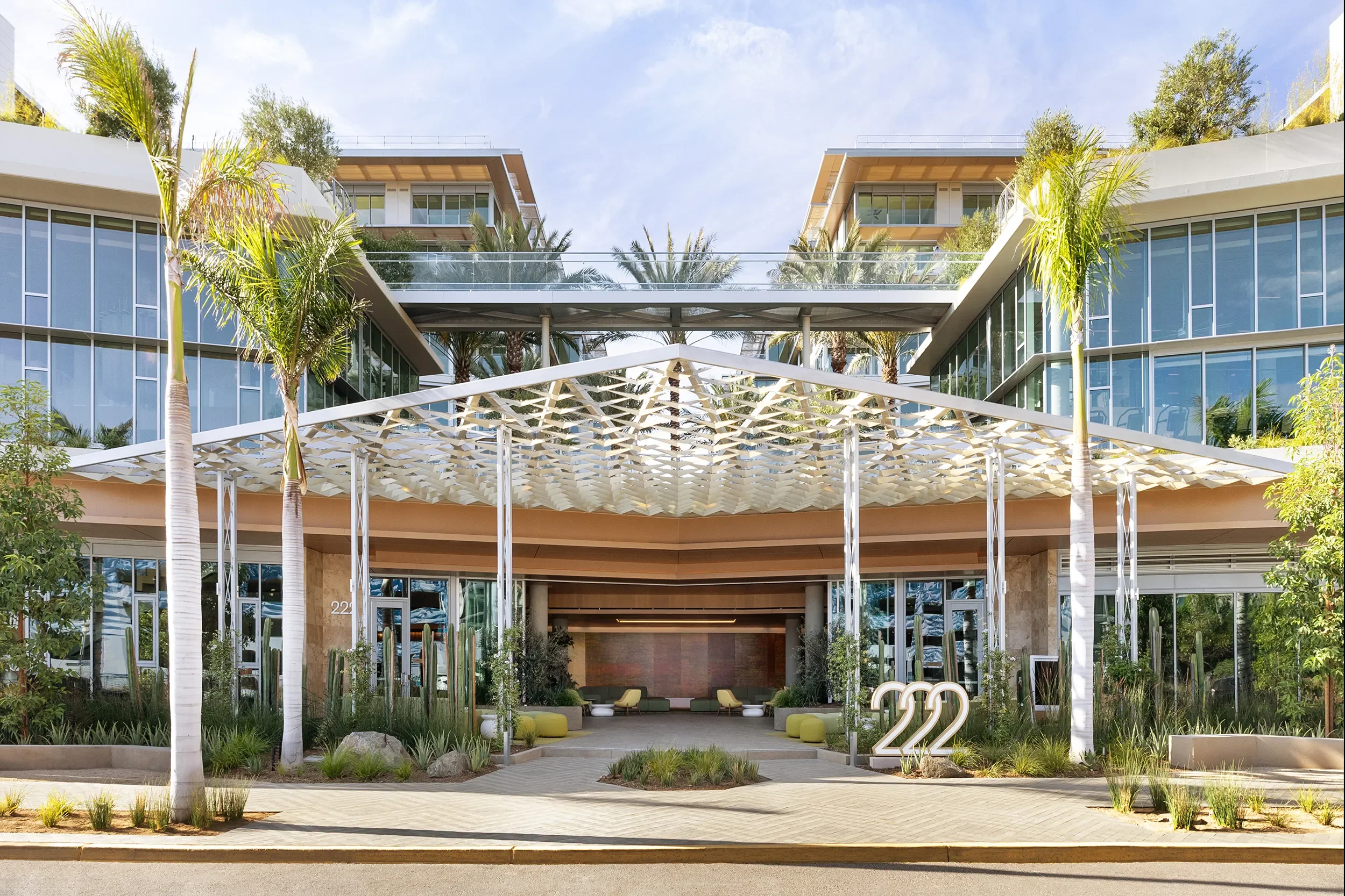 Perforated metal canopy over the courtyard entry at North City in San Marcos