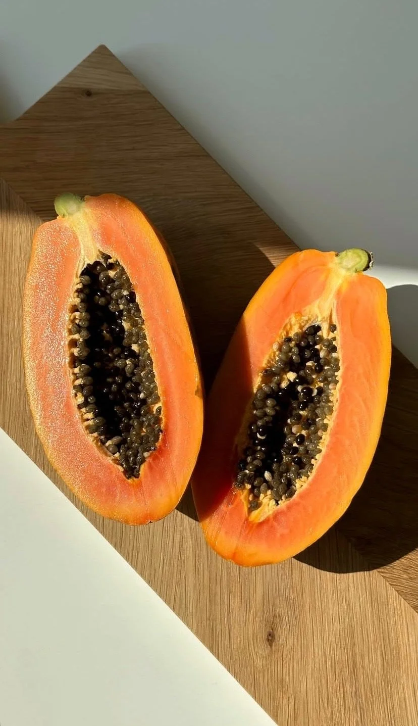Half-cut papaya on a wooden surface. Features colored graphics displayed in the ebook version of Dr. Troy Rohn's new book, 'Brain Medicine.' Breakthroughs in Gene Therapy for Anxiety & other Neuropsychiatric disorders.