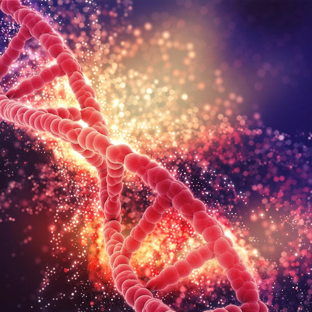 A digital illustration of a DNA double helix structure with glowing particles in the background.