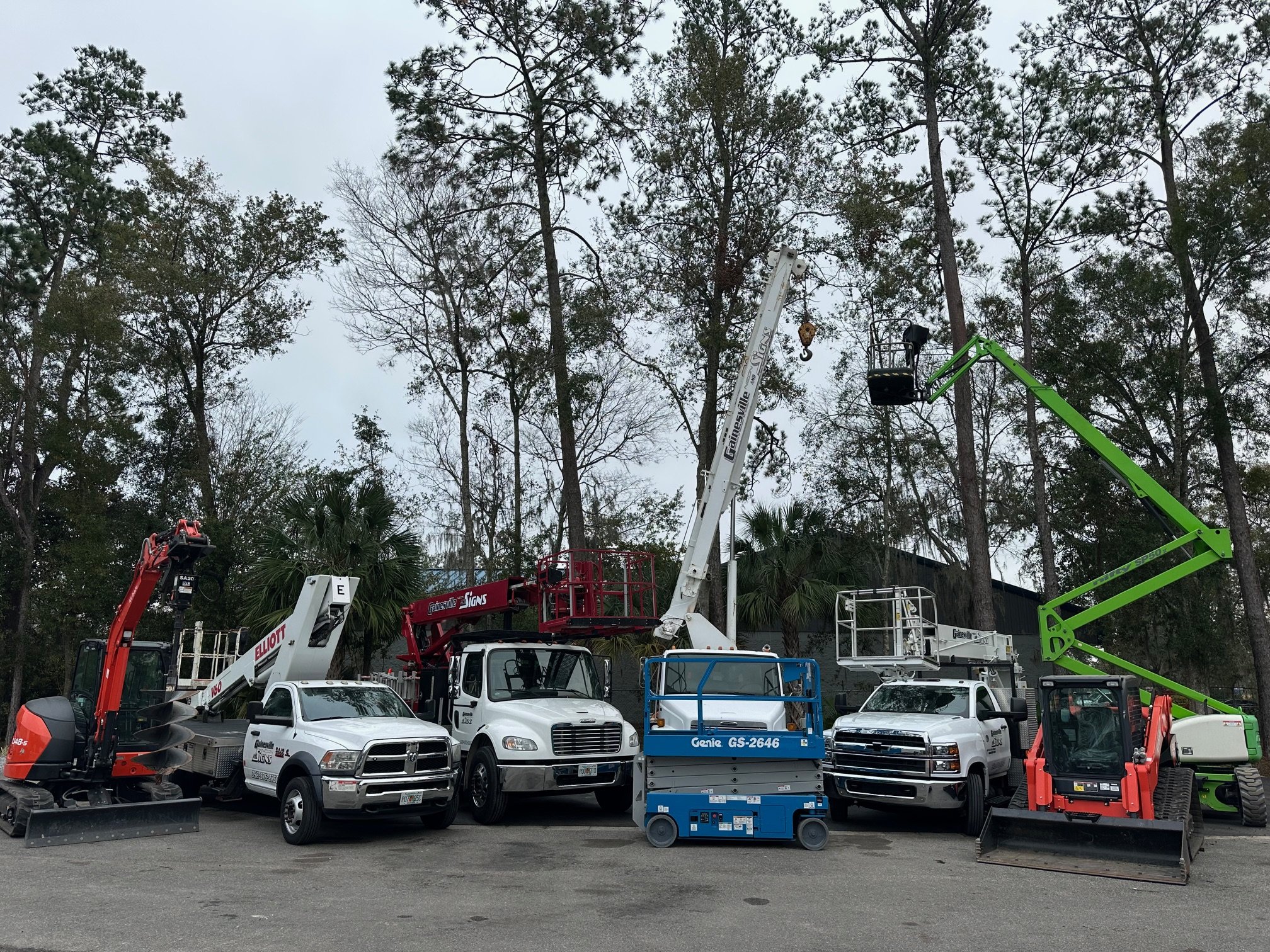 Row of lift trucks parked side by side