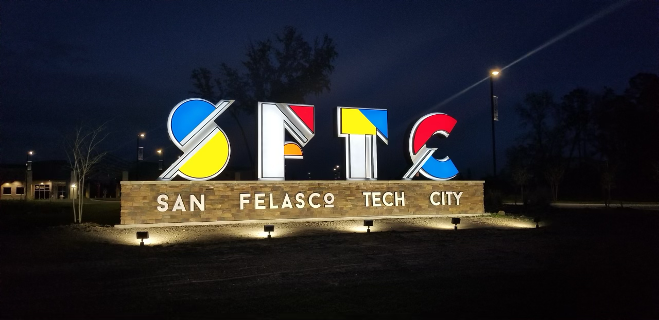 San Falasco Tech City neon sign illuminated