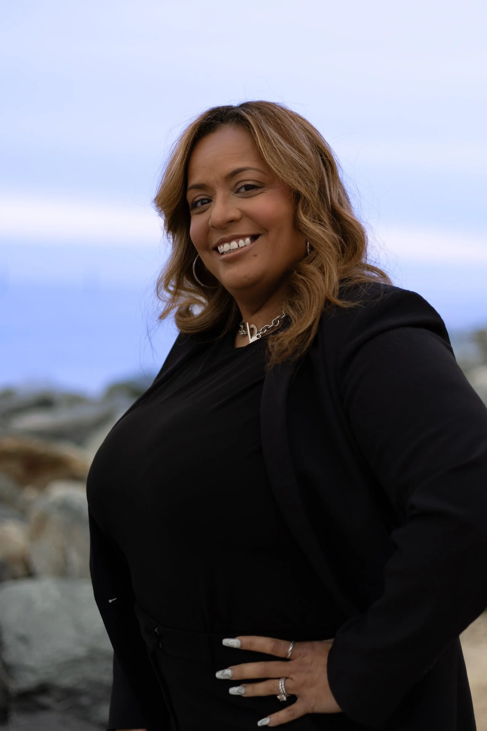 Professional portrait of woman outdoors in Rehoboth Beach