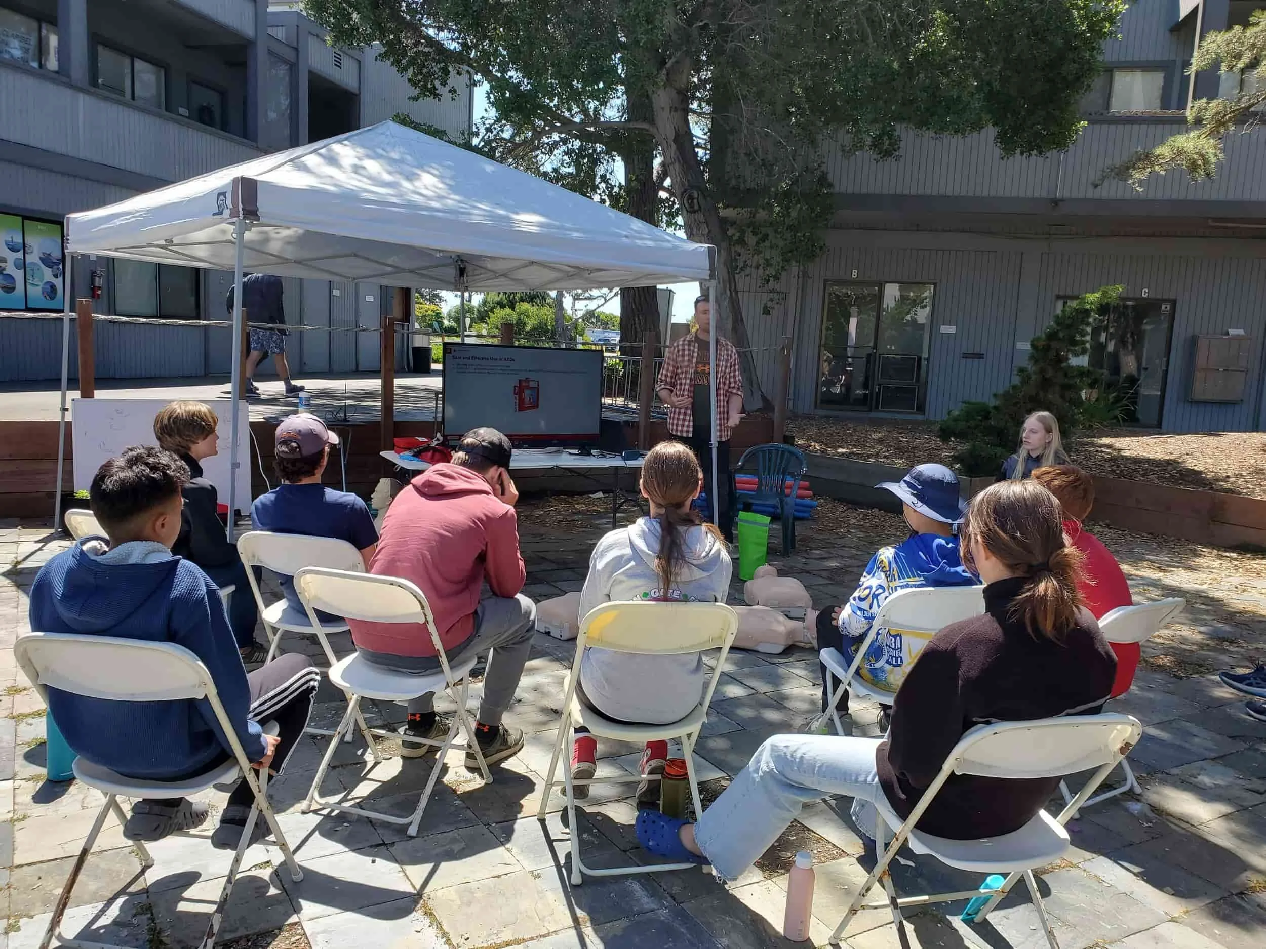 Teens learning CPR and First Aid training for the Leadership Training. 