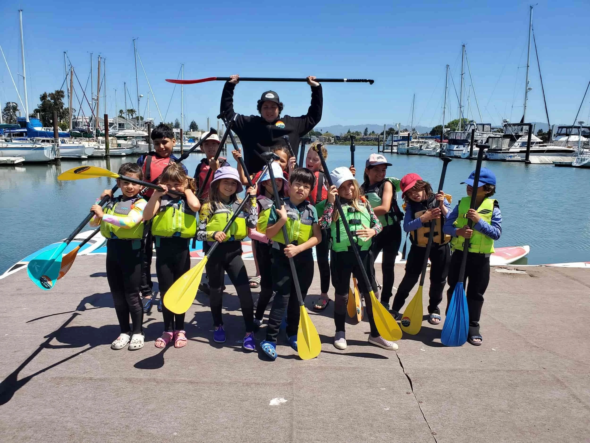 Group of elementary school children having fun at the best summer camp in Alameda, California.