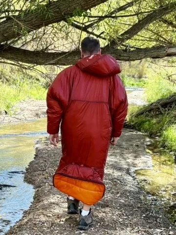 Walking is VERY easy in the Evolution SlumberSac. 
Go where you want, without needing to leave the warmth and comfort.