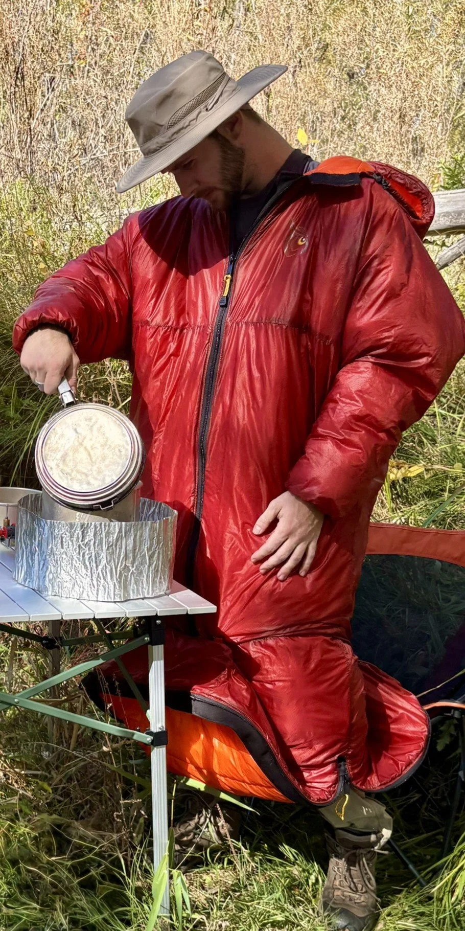 "Sleeping bag"? NOT! This is outdoor sleep gear designed to move with you. 
Whether it's tracking down gear in the campsite, heading out for that midnight pee-break, or just lounging while making coffee by the campfire.