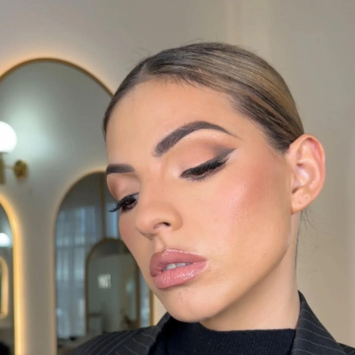 “Professional bridal makeup with soft glam eyeshadow and flawless skin