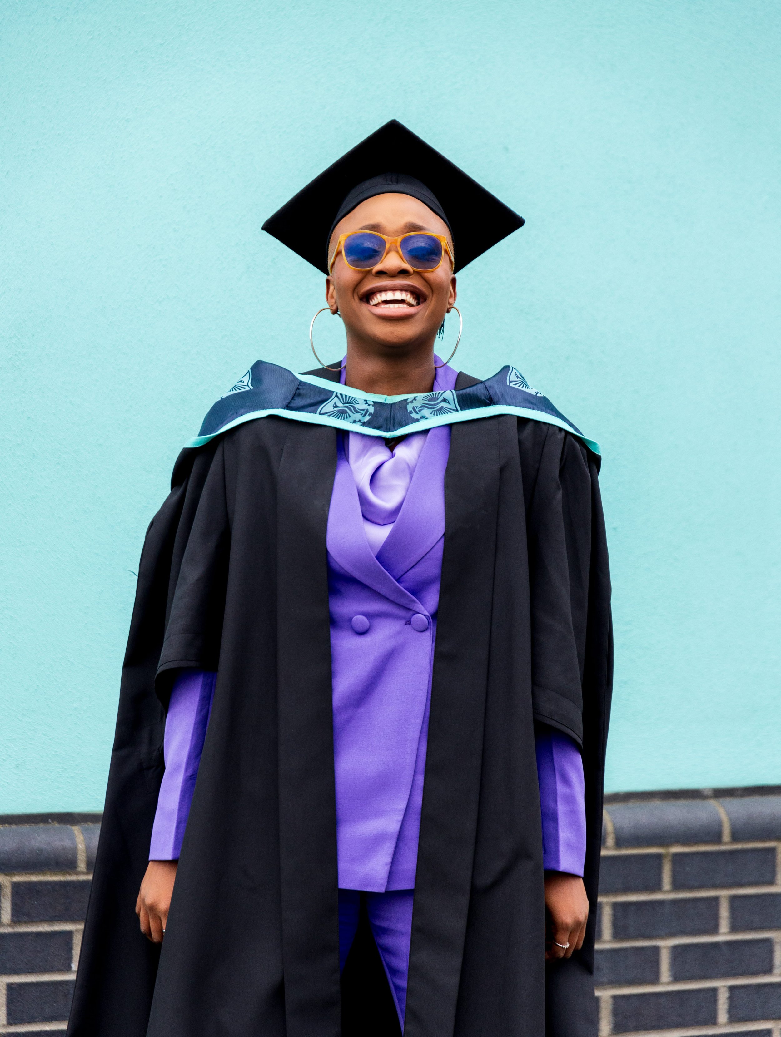 London graduation photographer capturing candid celebratory moment Barbican Centre