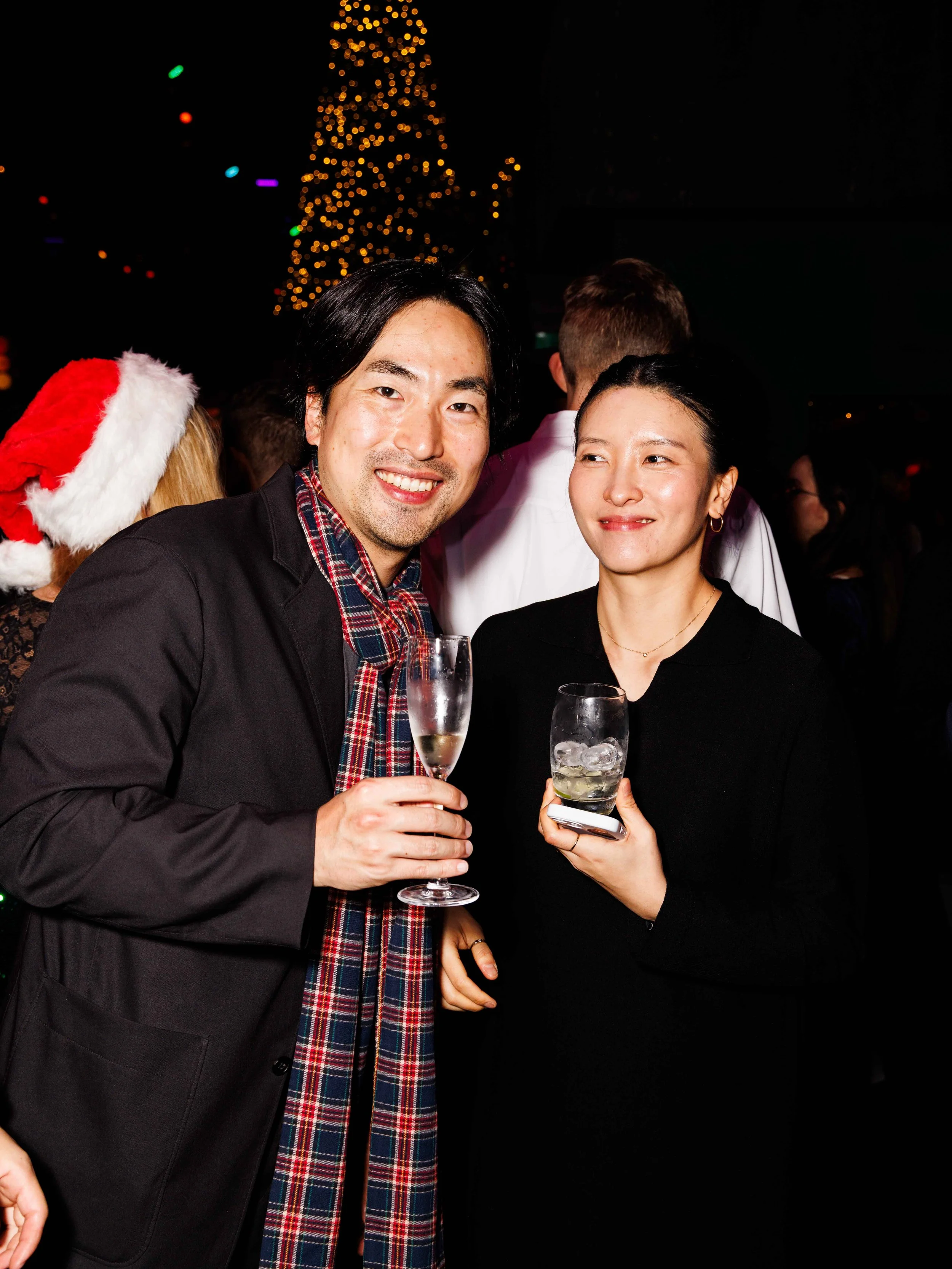 Friends toasting at a private Christmas party in London