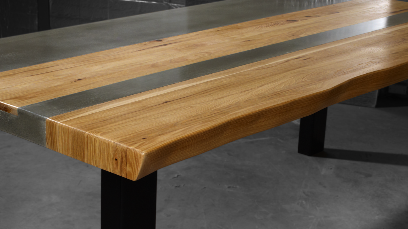 natural live edge wood and concrete dining table on black finished steel base