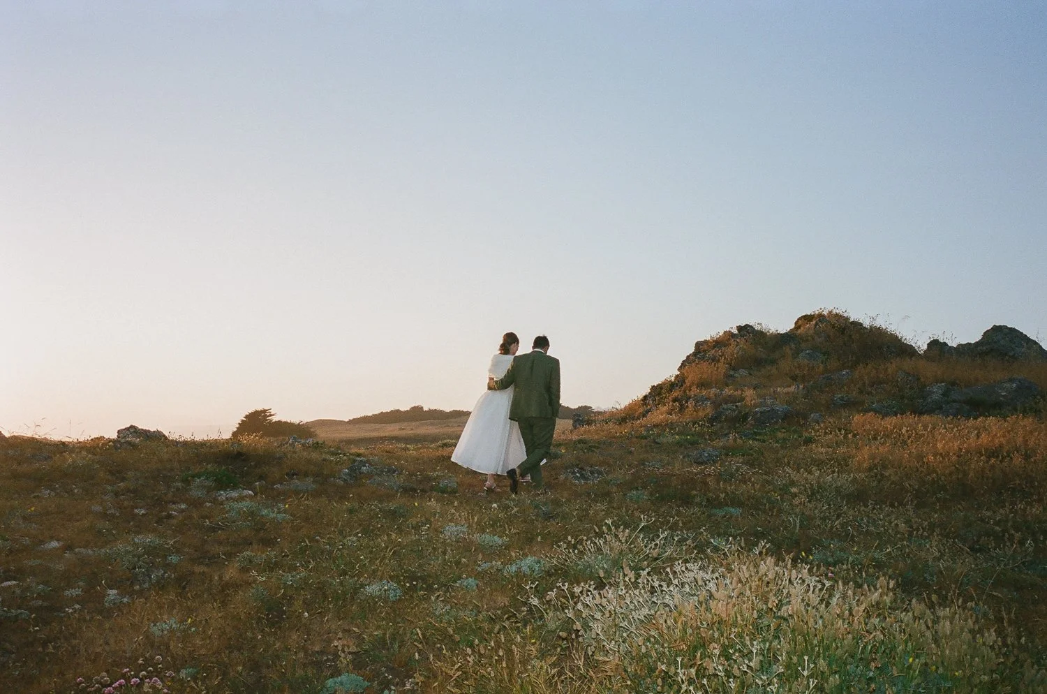 Bride and groom portraits overlooking the Pacific Ocean at The Sea Ranch