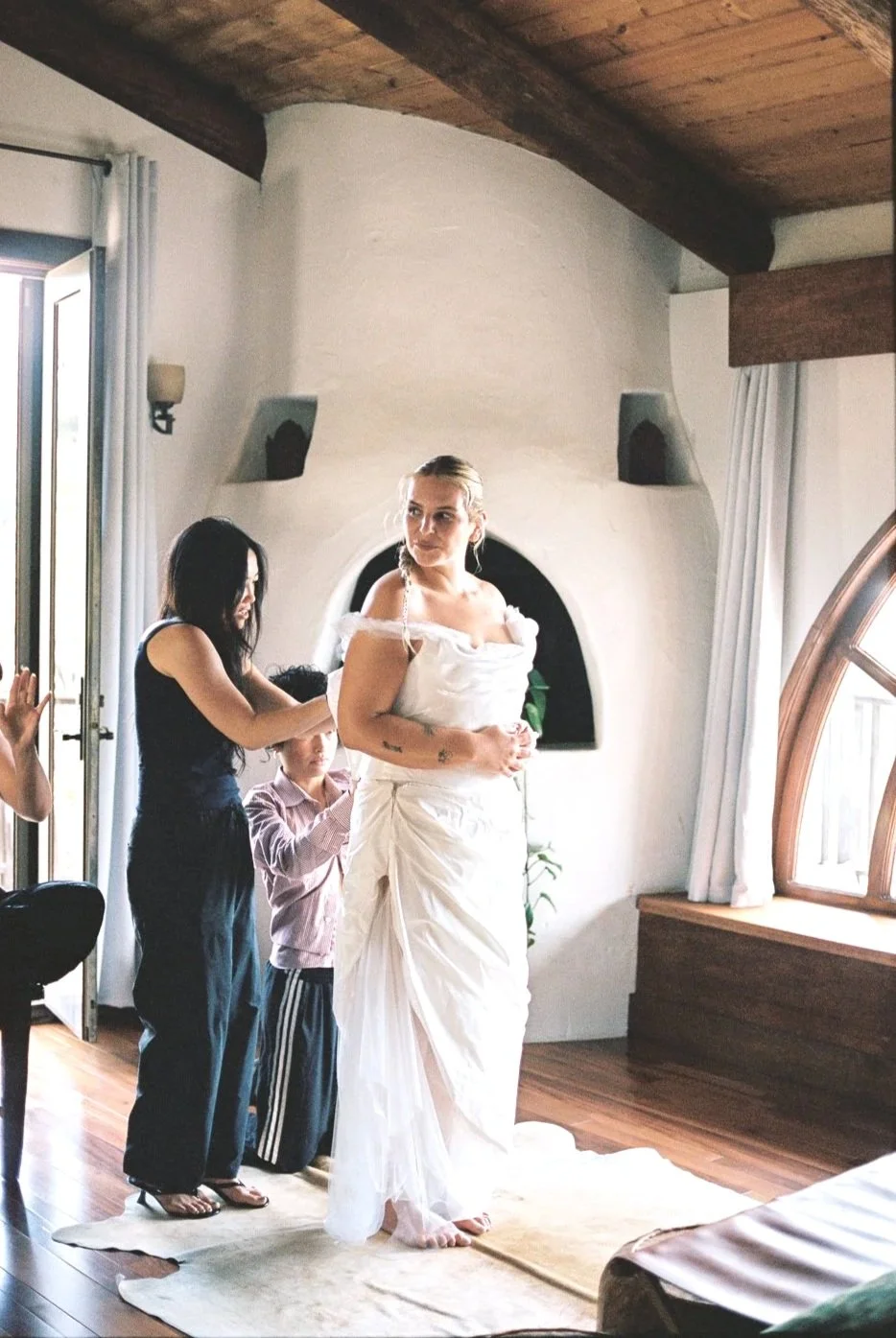 Paige wearing her custom silk romantic wedding gown