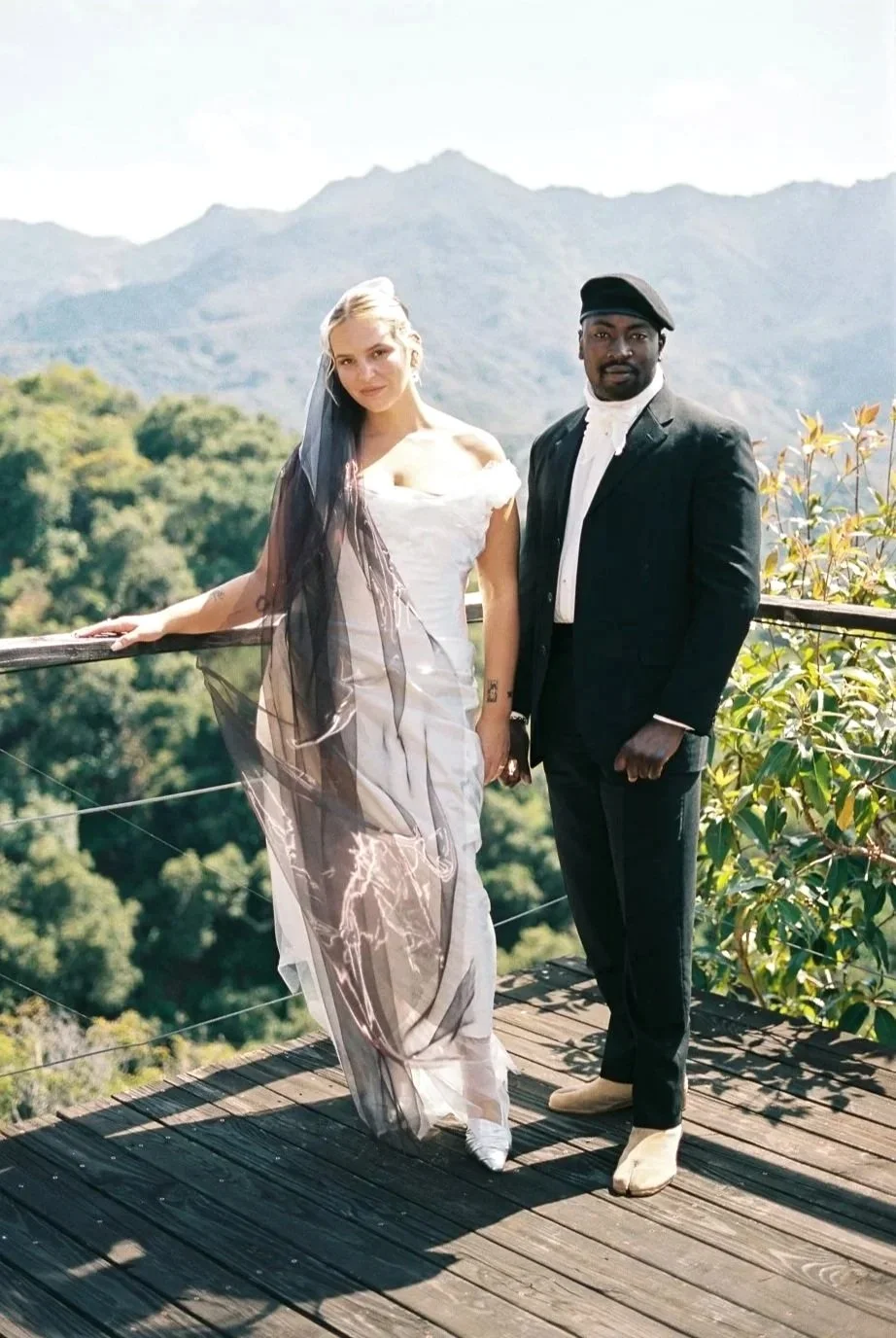 Paige wearing her custom silk wedding gown by Sewing Archives