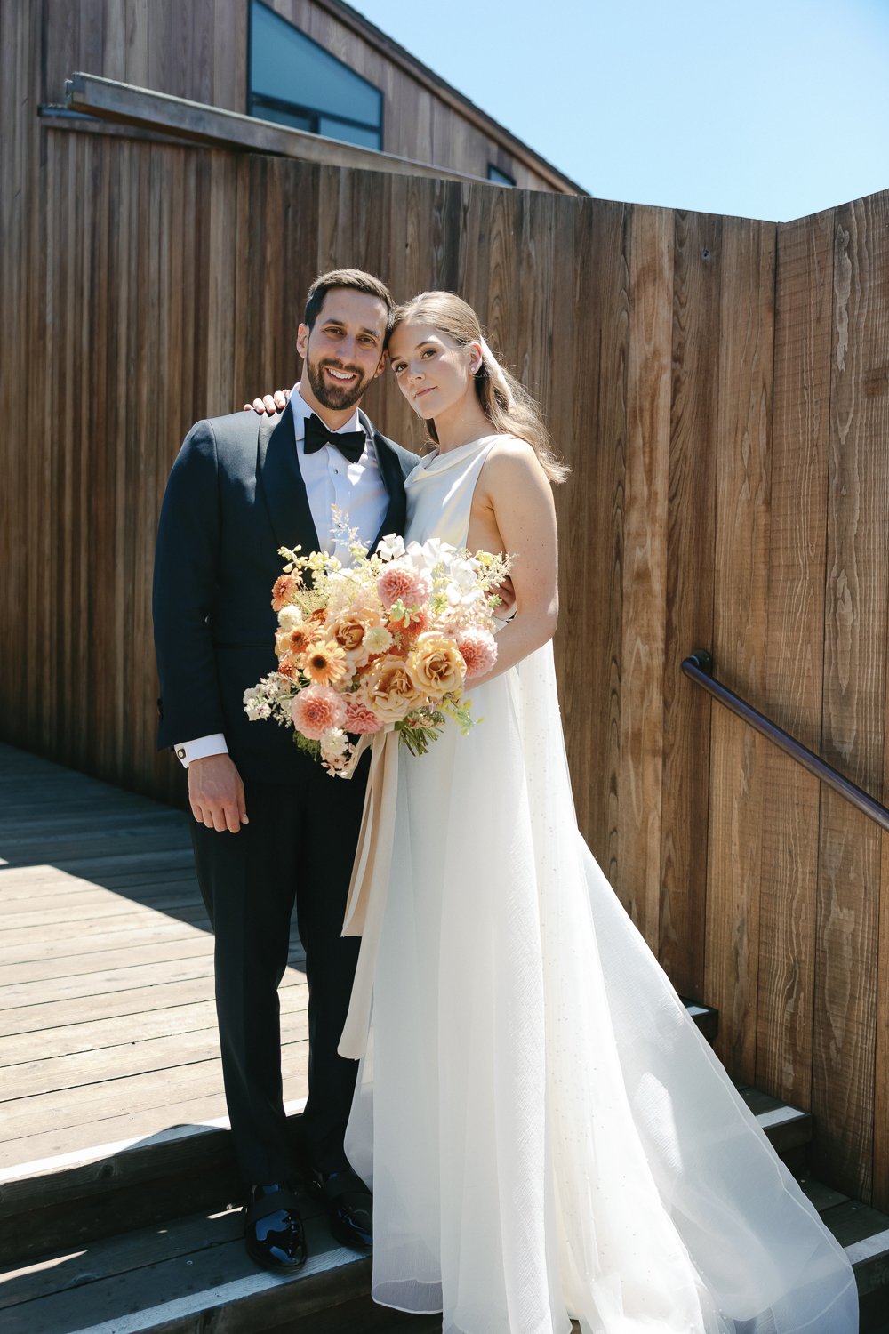 Bride and groom enjoying the coastal landscape at The Sea Ranch in Northern California