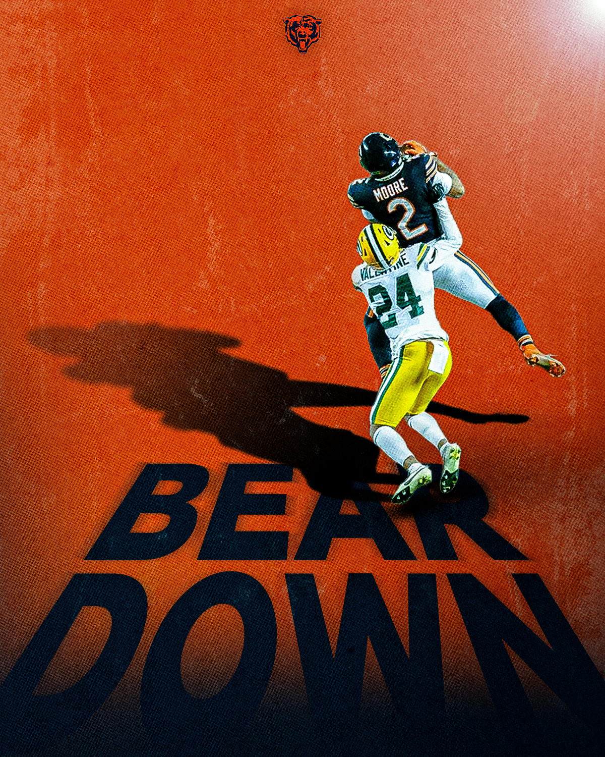 An NFL player from the Chicago Bears making a catch against a Green Bay Packers defender with a bold "BEAR DOWN" text on the ground and a bear logo at the top.