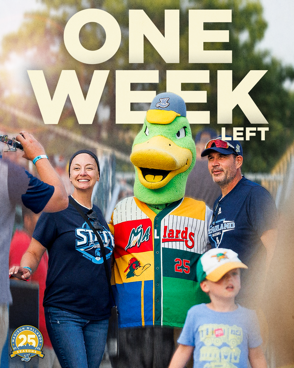 A woman, a man, and a child posing with the mascot of the Myrtle Beach Pelicans baseball team at an outdoor event. The woman is smiling, the man is wearing a cap, and the mascot, which resembles a green crocodile wearing a colorful jersey, is standin