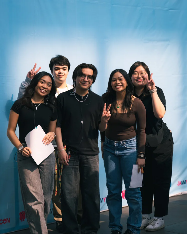 JAMMY CON volunteers posing together during the event