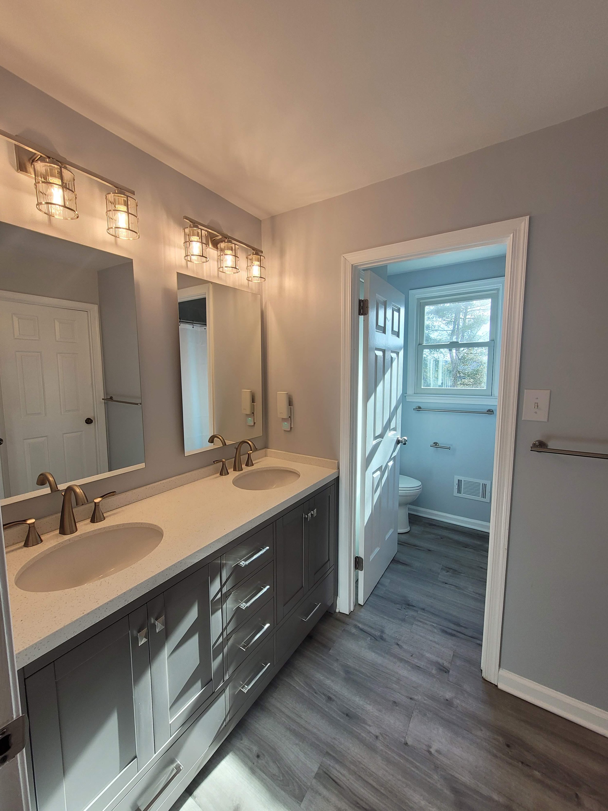 Bill & Jen Hall Bath Floor (LVP)