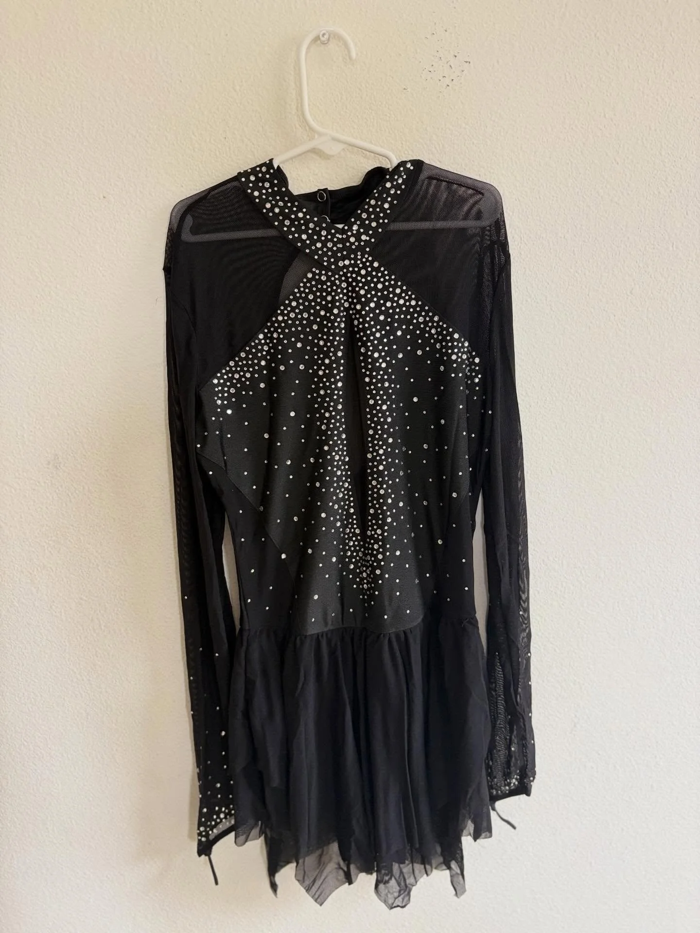 For skaters ages 12&ndash;16, this elegant black dress is all about timeless simplicity and sophistication.
Freely gifted to the next skater. 🖤