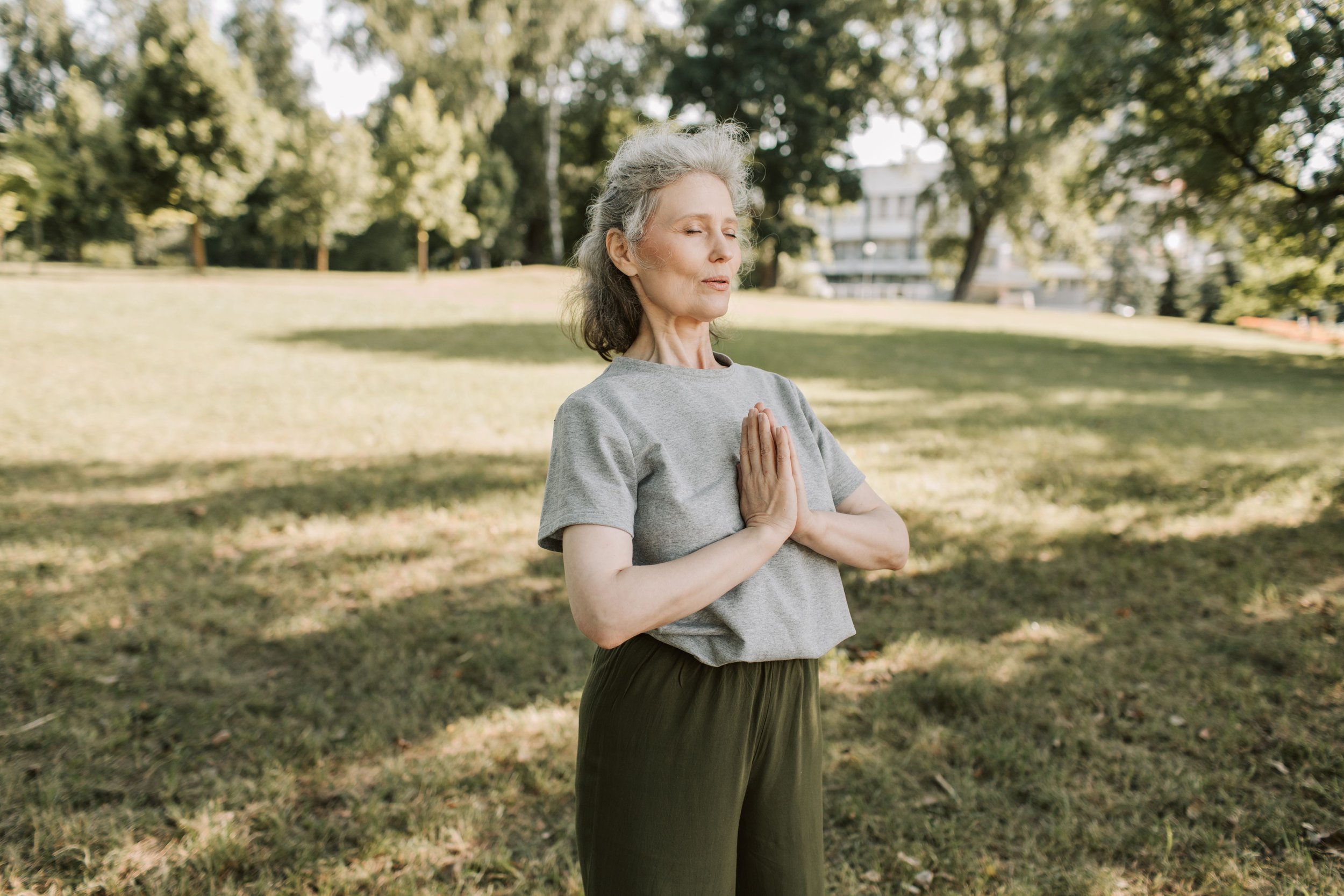 a nurse meditating and doing yoga for self-care