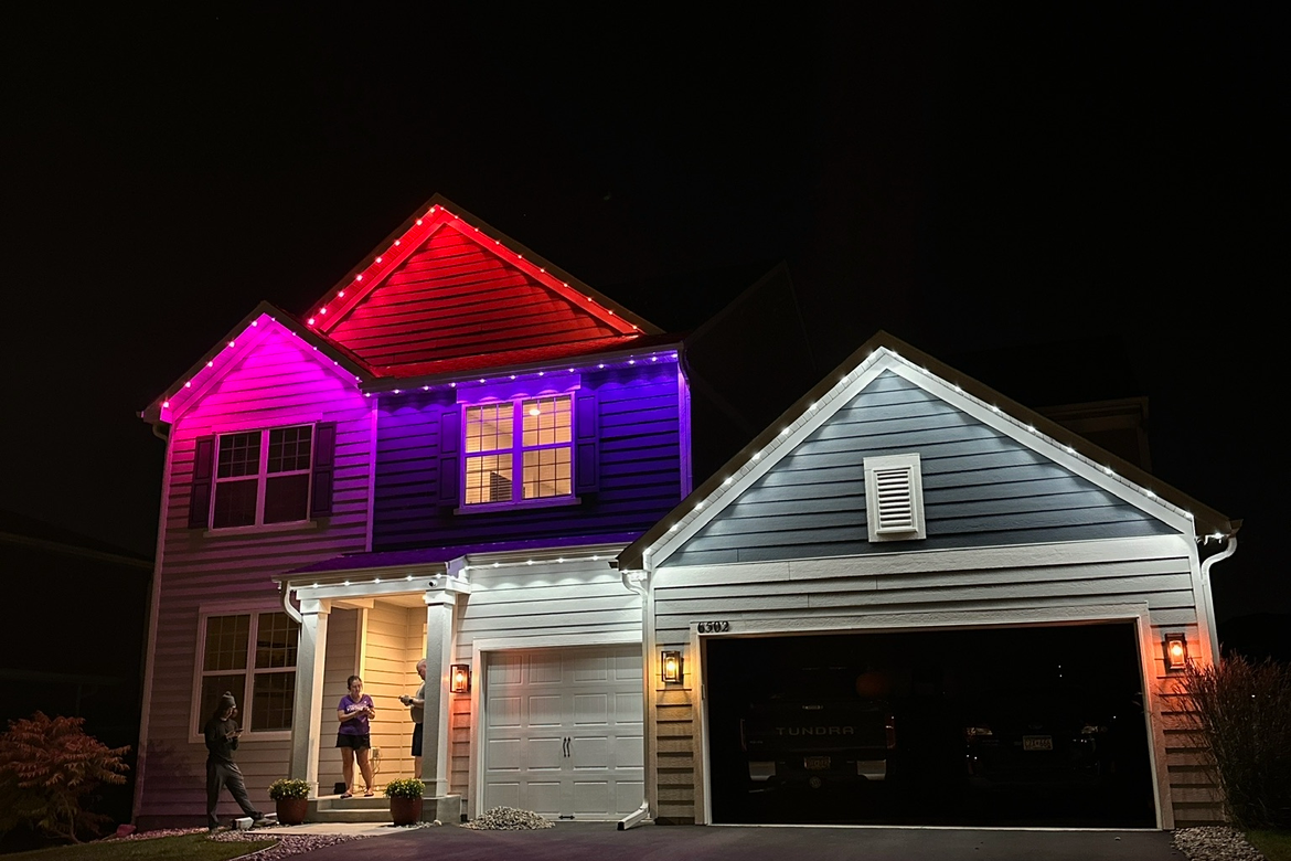 Permanent LED roofline lighting on a Bozeman Montana home with stunning holiday seasonal display