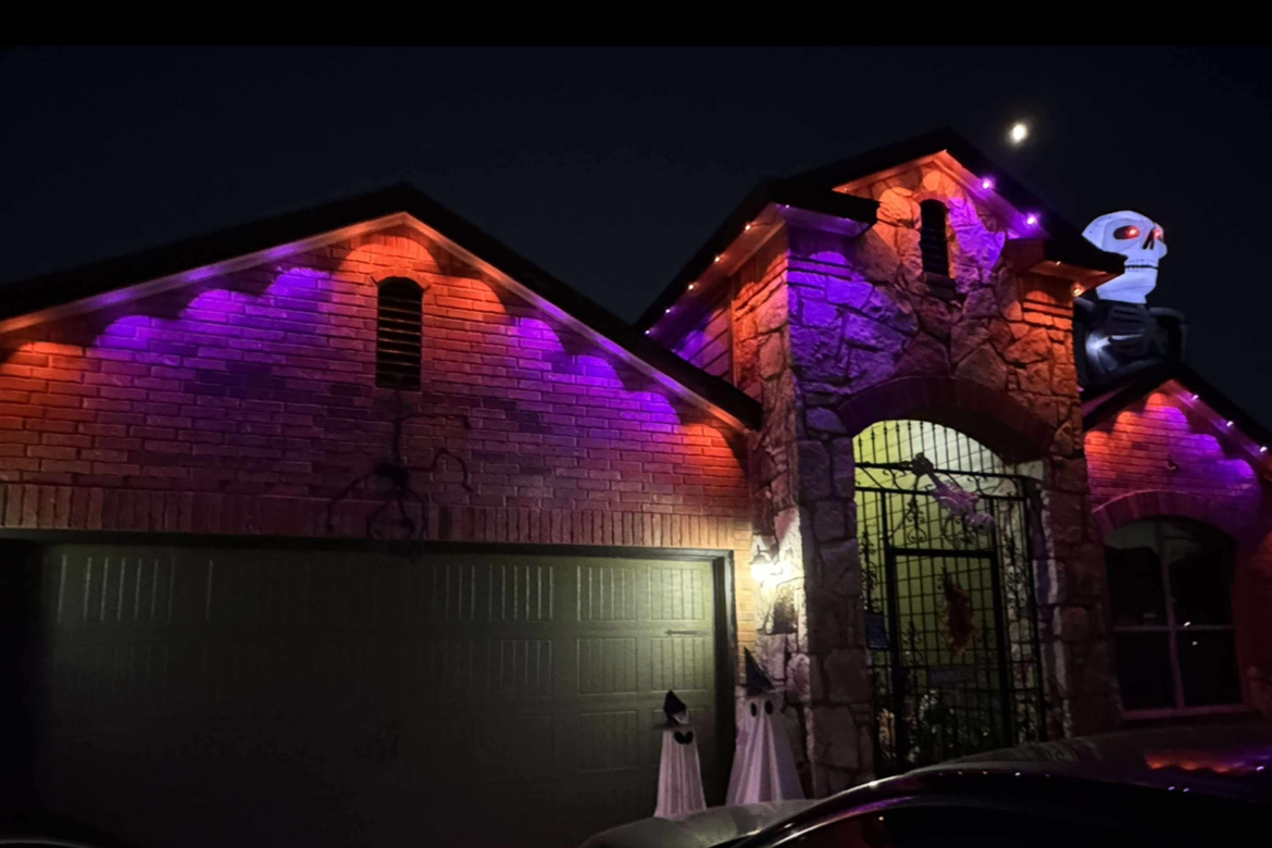 Holiday lighting installation on a Houston Texas home with full perimeter LED coverage