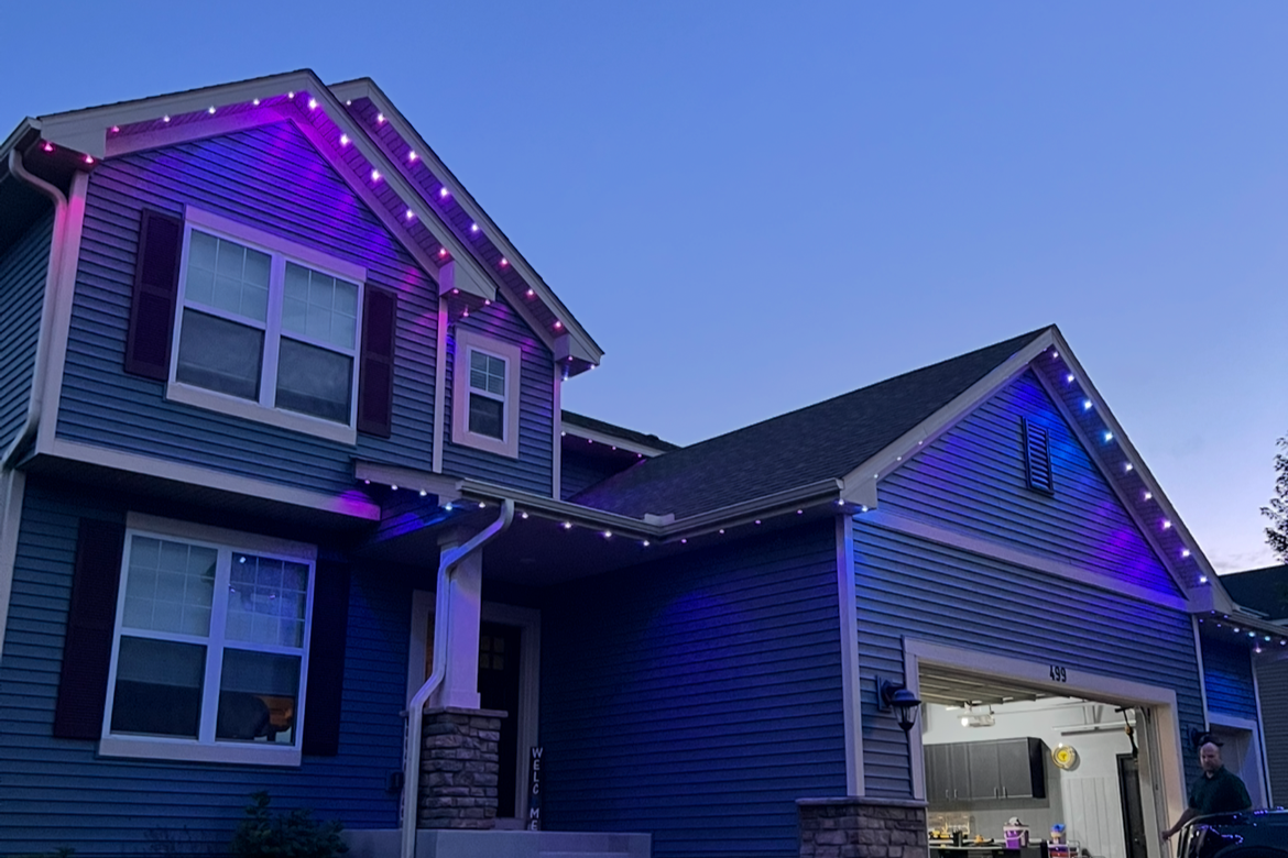 Christmas lighting installation on a Kansas City Missouri home with full roofline LED coverage