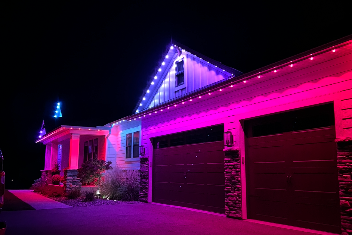 Professional permanent LED lighting install on a Minneapolis home with full roofline holiday coverage