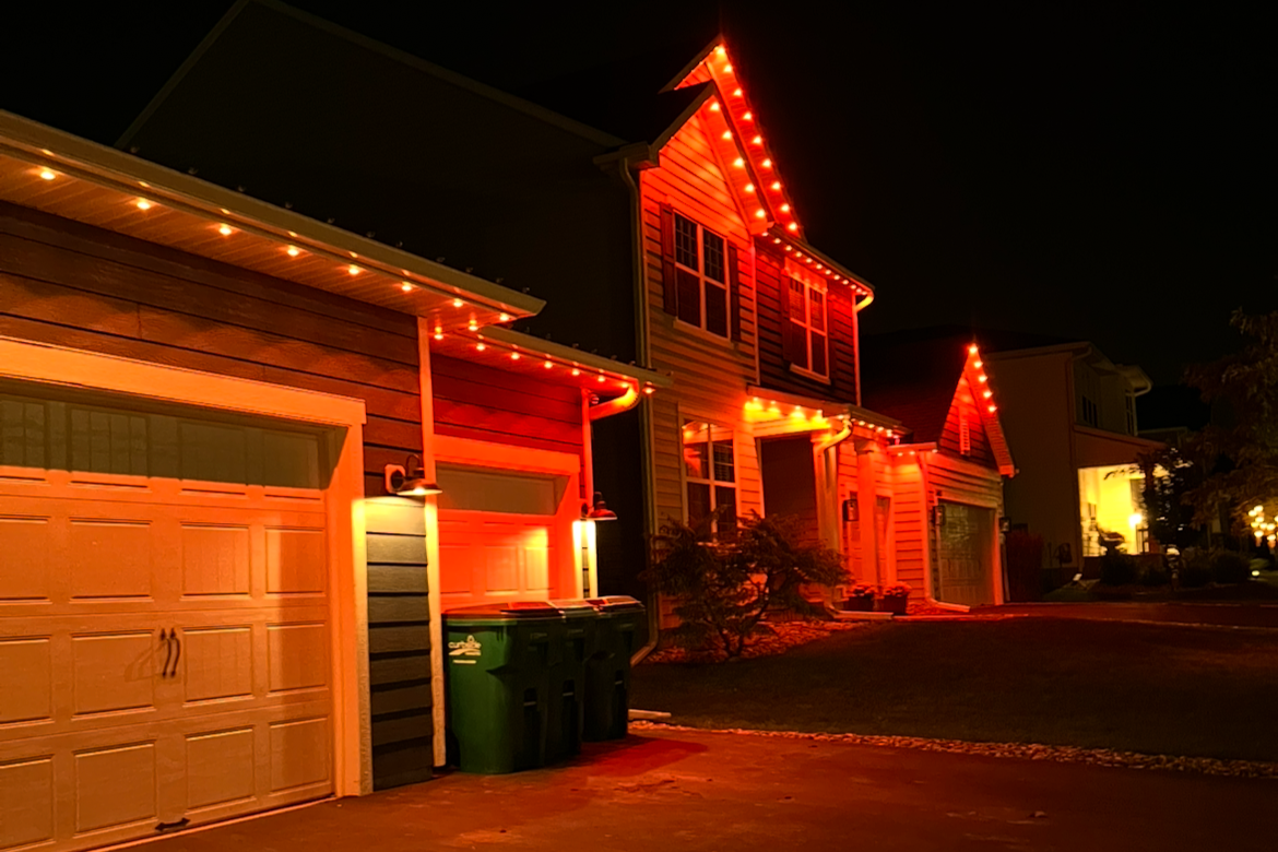 Holiday lighting on a Minneapolis Minnesota home with synchronized full roofline LED display