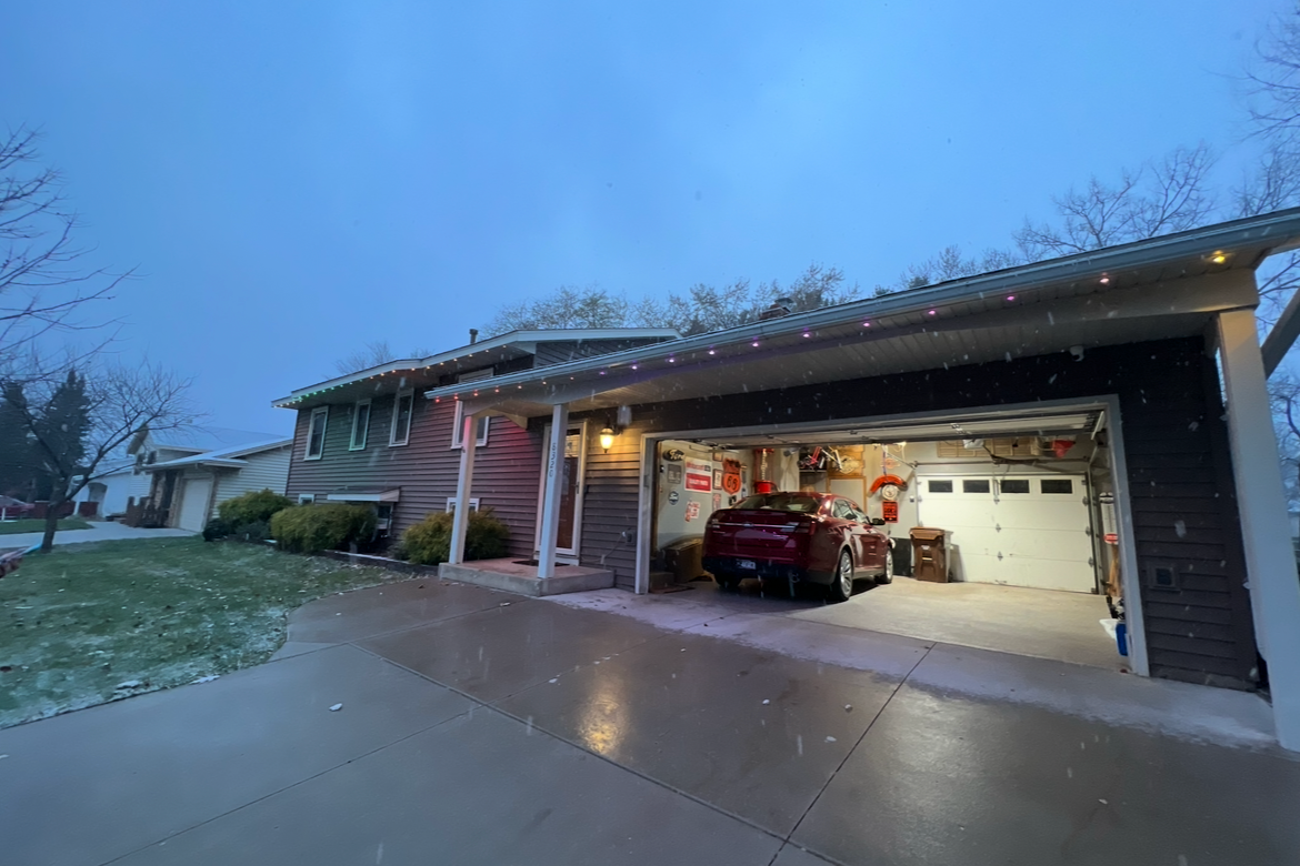 Professional LED lighting on a Bozeman home with full roofline Christmas installation