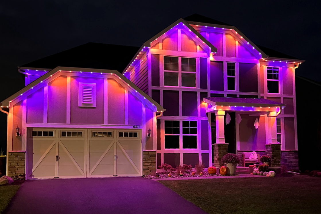 App-controlled roofline LEDs on a Bozeman Montana home set to Halloween seasonal display