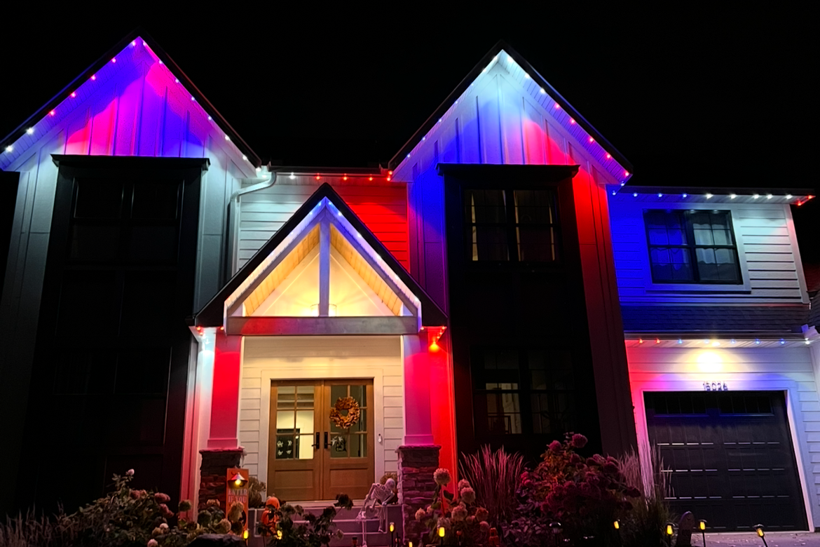 App-controlled permanent LEDs on a Minneapolis Minnesota home set to Fourth of July patriotic display