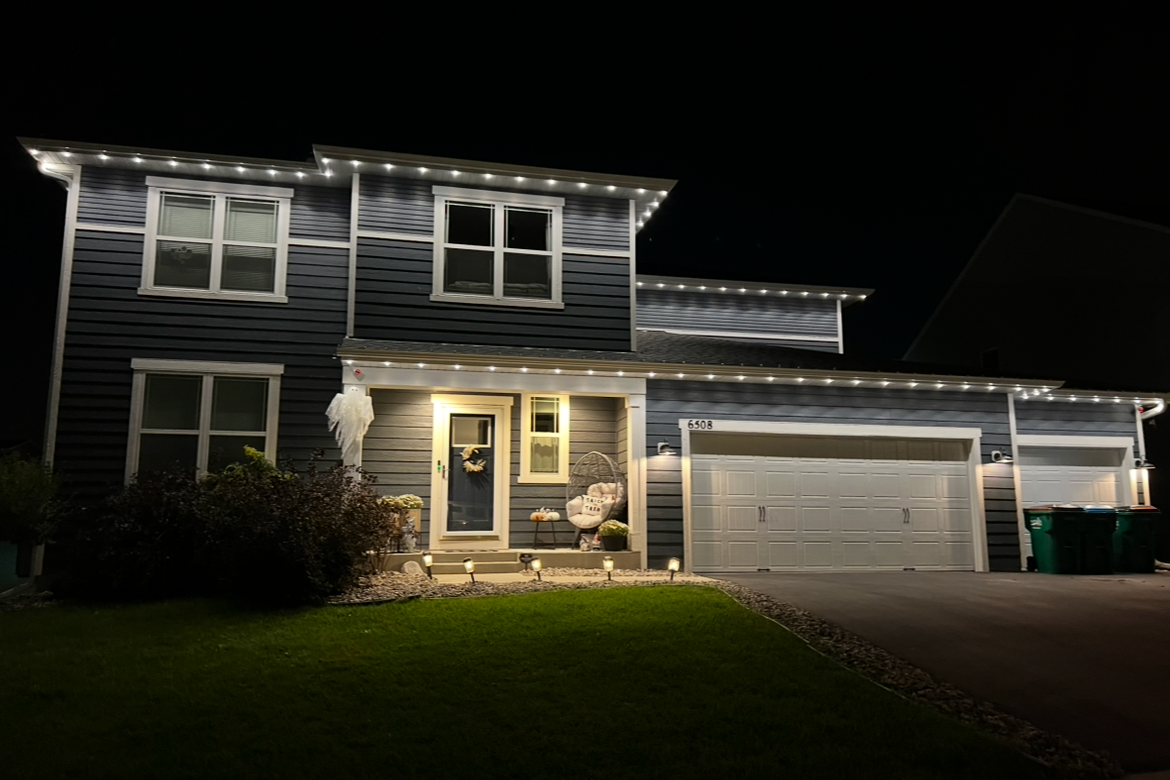 Peak Lighting USA professional permanent install on a Minneapolis Minnesota home with full roofline LED coverage