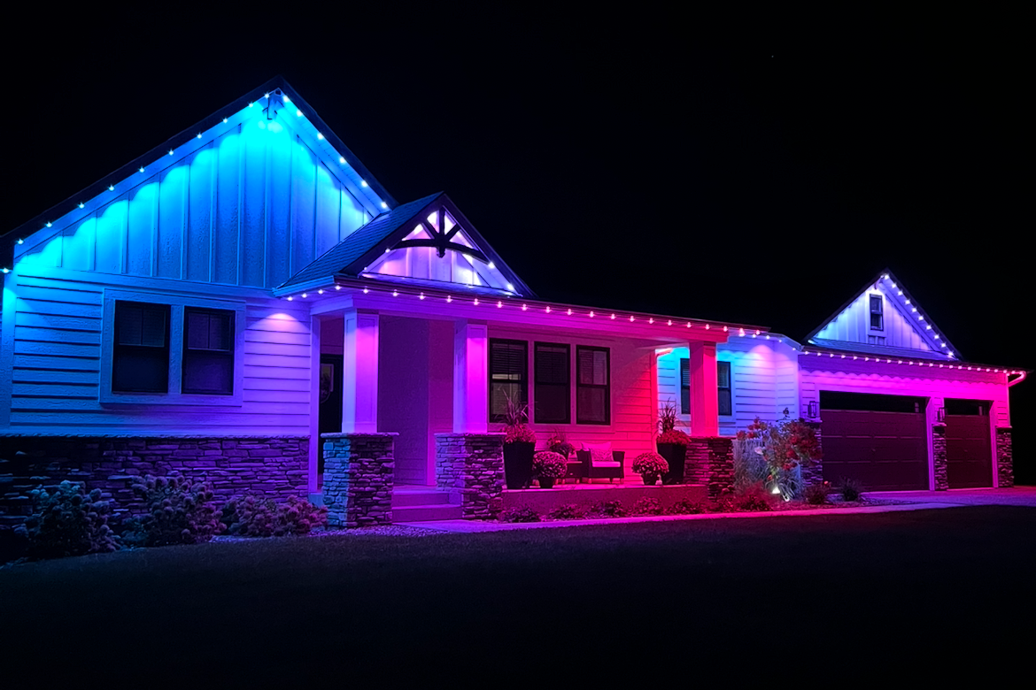 Permanent outdoor LEDs on a home with year-round roofline glow