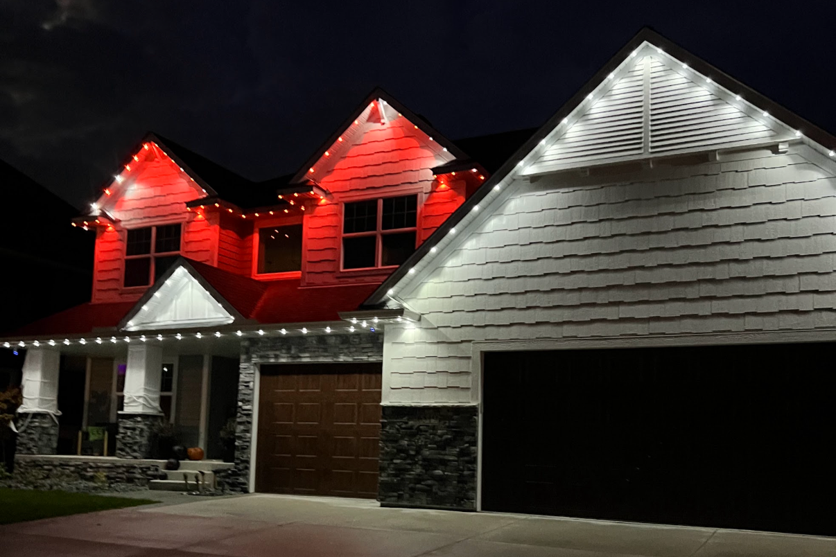 Professional permanent lighting on a Seattle Washington home with full perimeter soffit coverage