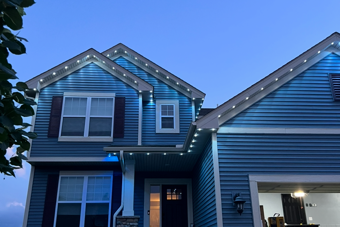 Permanent outdoor LEDs on a Bozeman home with year-round roofline glow