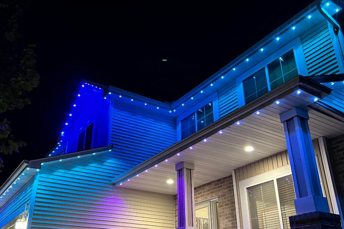 Holiday lighting installation on a Seattle Washington home with full perimeter LED coverage