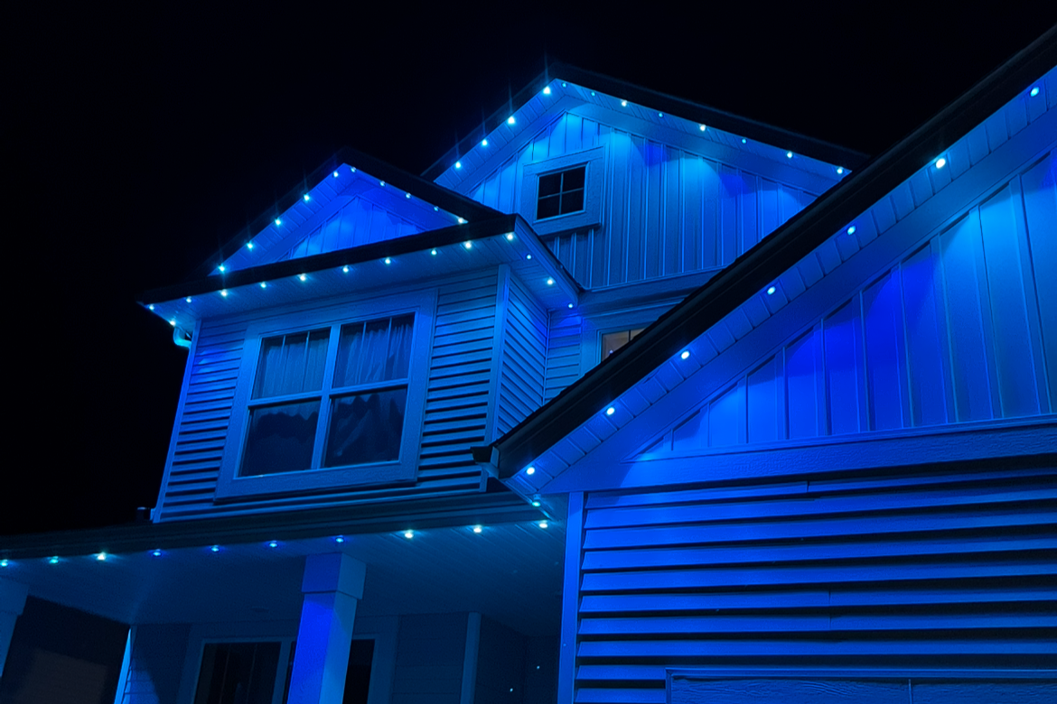 Holiday lighting on an Austin Texas home with synchronized full roofline LED display