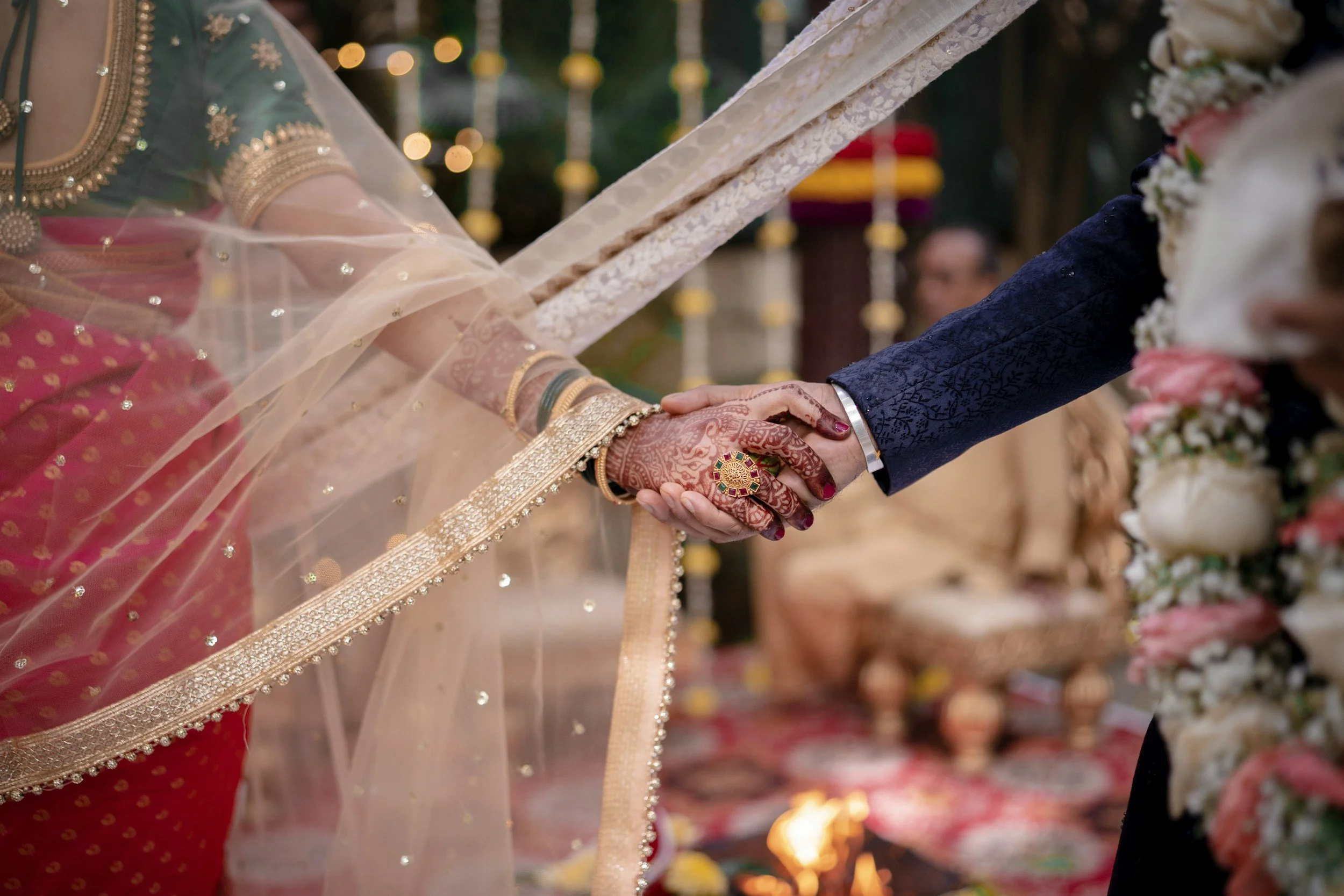 South Asian Couple holding hands after wedding ceremony in Riviera Maya Mexico