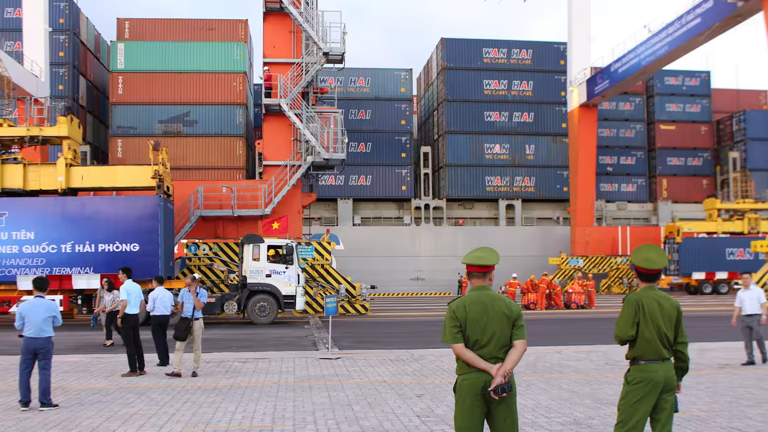 Cargo truck and shipping containers at Lạch Huyện International Port in Hai Phong, Vietnam