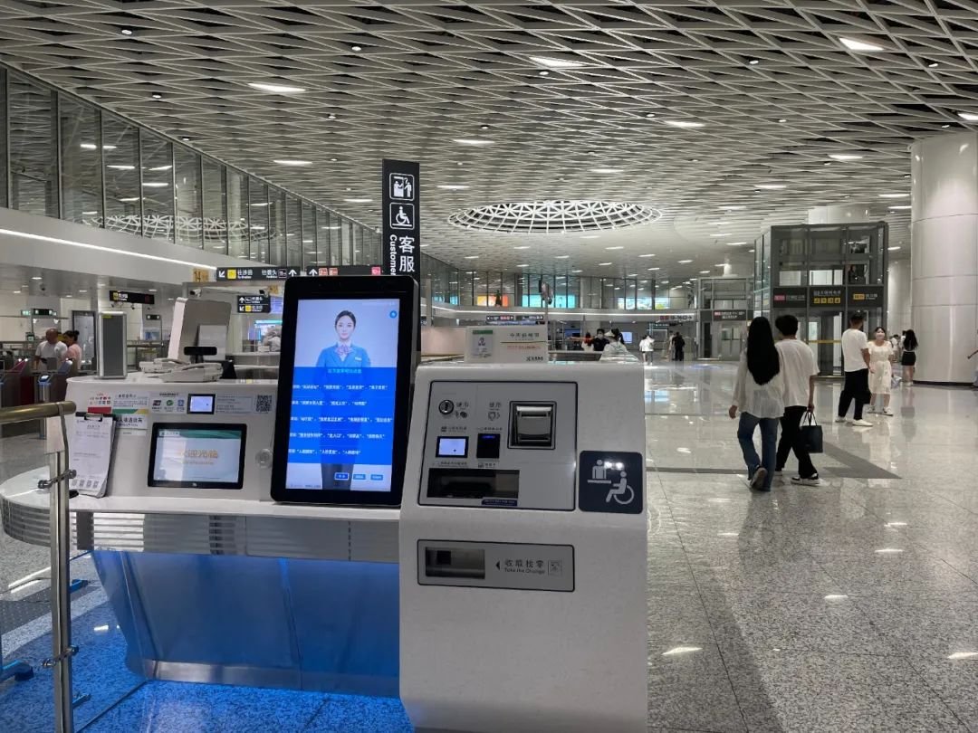 An AI-powered customer service kiosk at Gangxia North Metro Station in Shenzhen, China