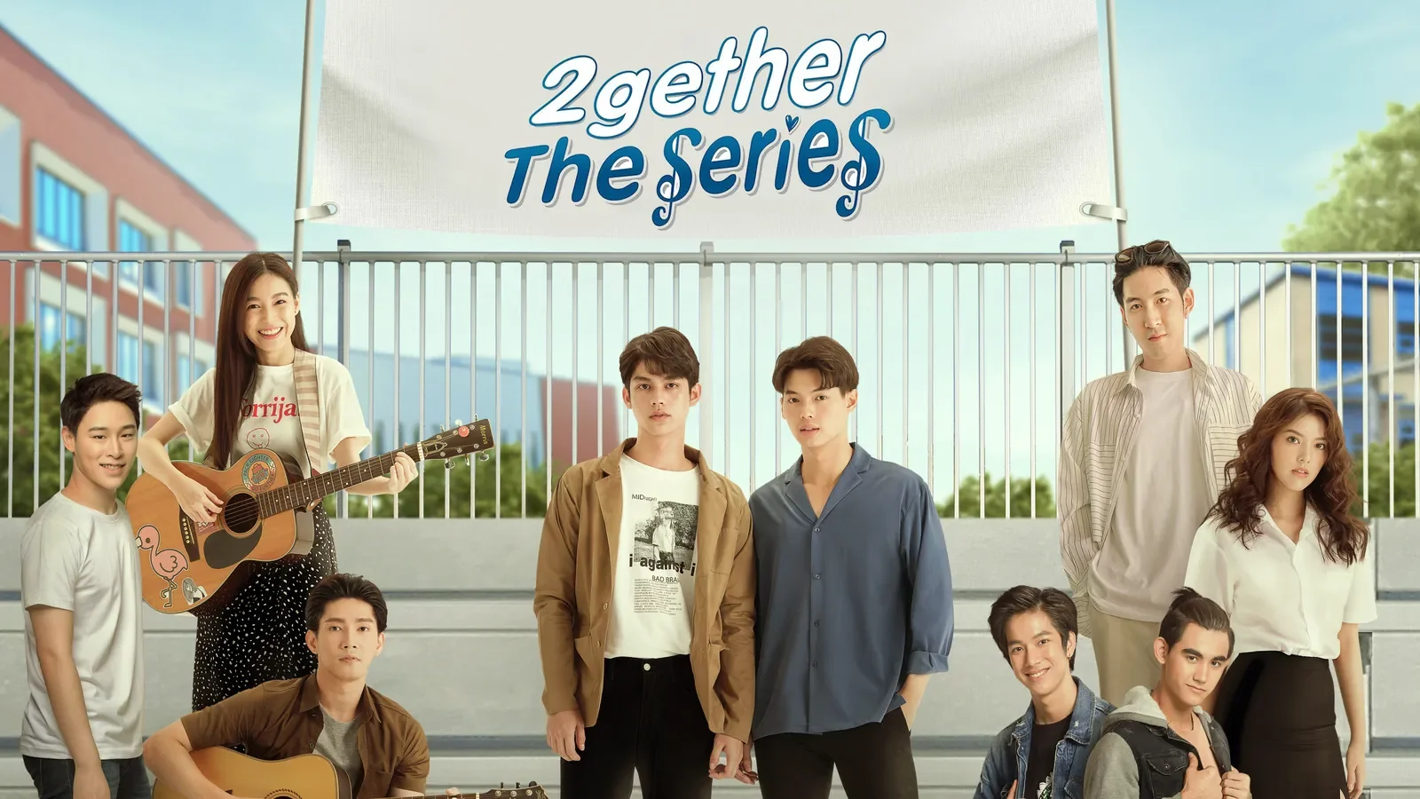 Cast of the Thai BL television series 2gether The Series standing together in front of a banner with the show’s title
