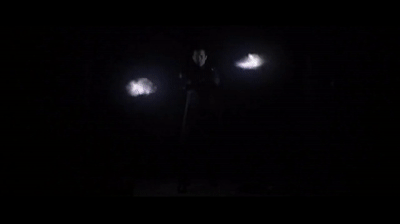 Flashes of gun fire in the dark as Cleric John Preston clears a room